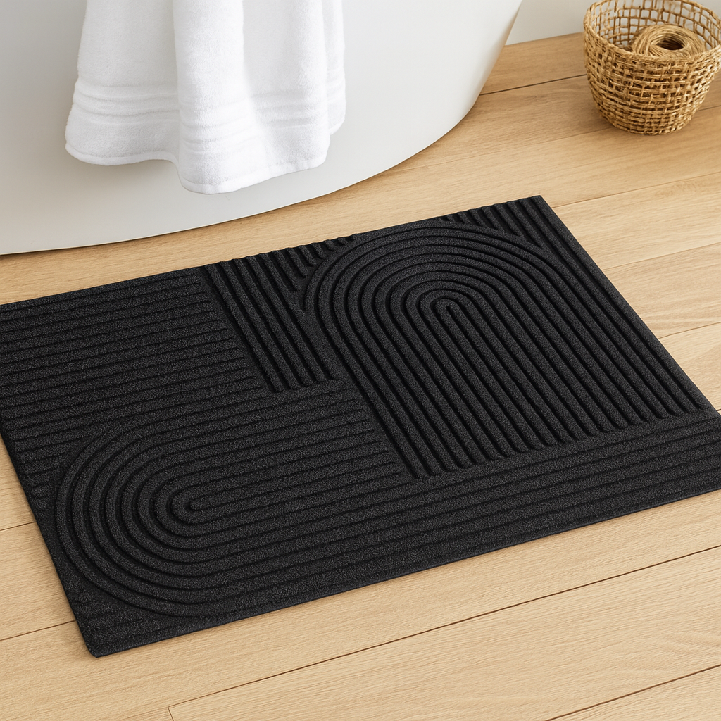 Rechthoekige deurmat met reliëf geometrisch patroon.