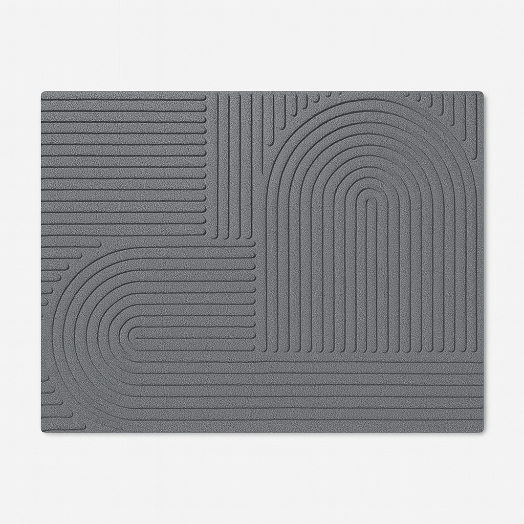 Rechthoekige deurmat met reliëf geometrisch patroon.