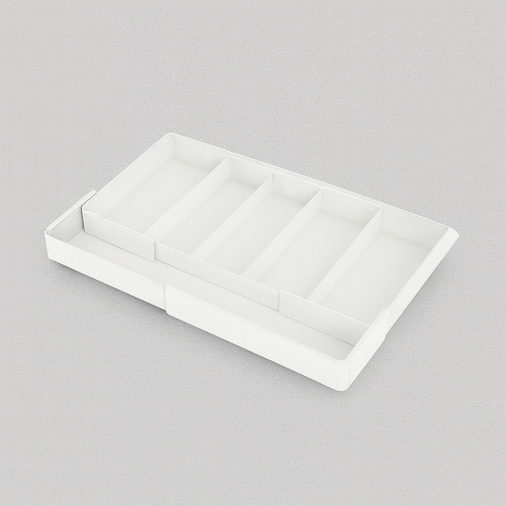 Acryl keukenlade-organizers met bestek, gereedschap en kookaccessoires.