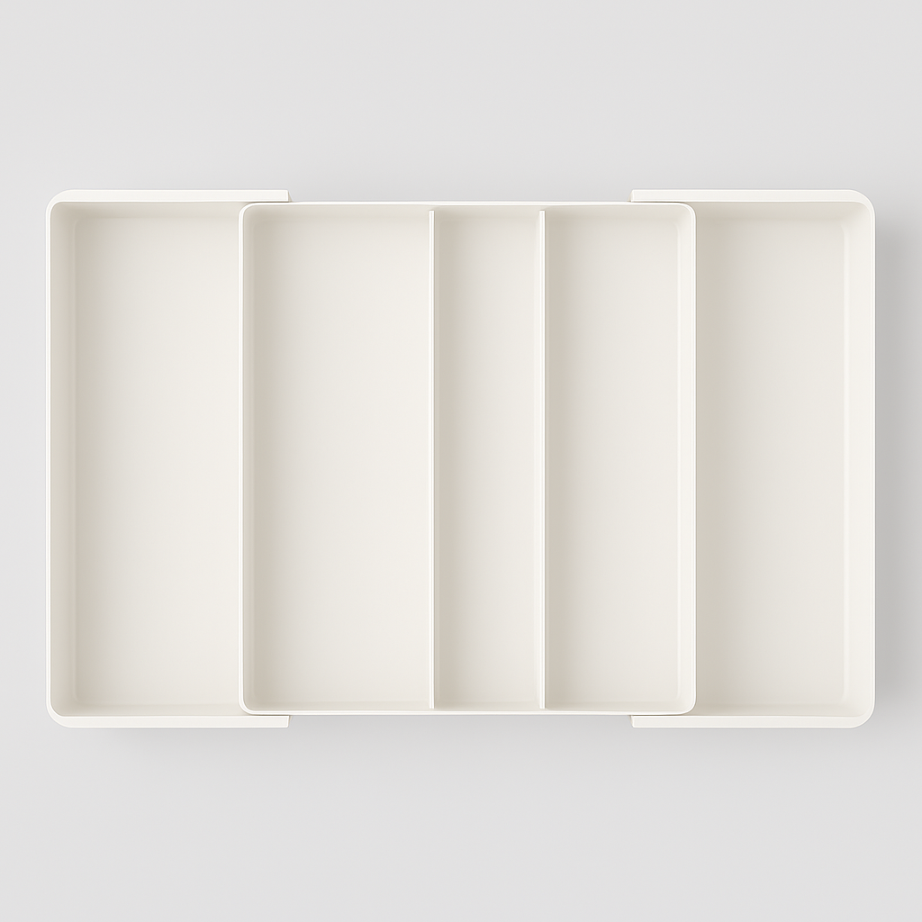 Acryl keukenlade-organizers met bestek, gereedschap en kookaccessoires.